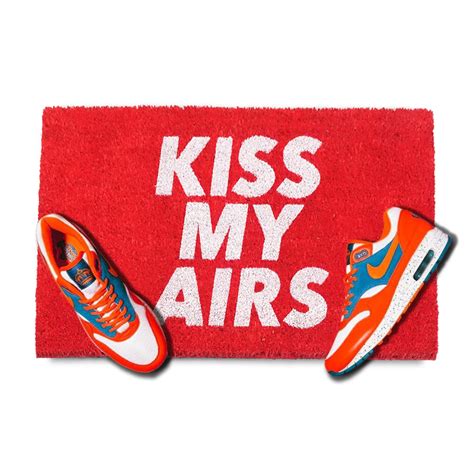 OnlyMat Red "Kiss My Airs" Coir Doormat with Anti-Slip Backing