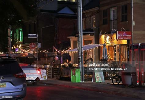 Patio Dining In Torontos Baldwin Village On A Summer Night High-Res ...