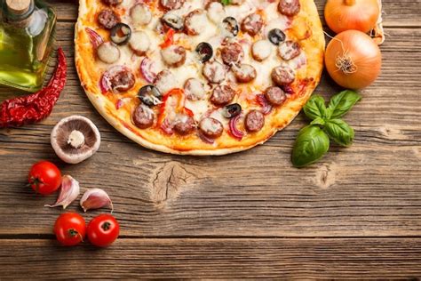 Pizza with ingredients | Premium Photo