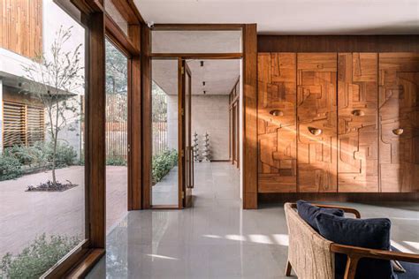 Mango trees and archtypal courtyards breathe life into this family home ...