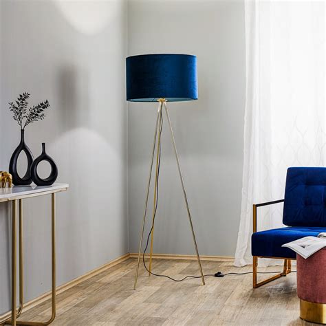 Monaco floor lamp, three-legged, gold, blue velvet | Lights.ie
