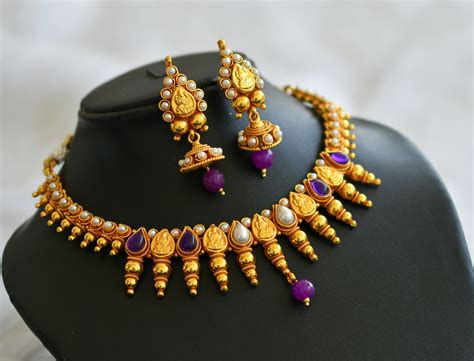 Gold tone purple-pearl stone lakshmi necklace set dj-45892 – dreamjwell
