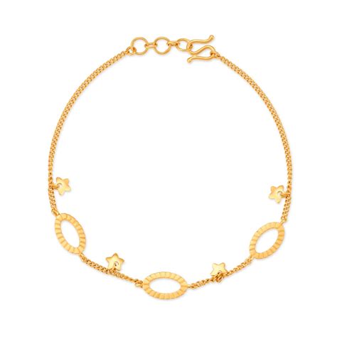 Adorable Yellow Gold Star Charm Bracelet