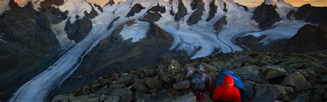 Download wallpaper snow, mountains, stones, rocks, the slopes, people ...