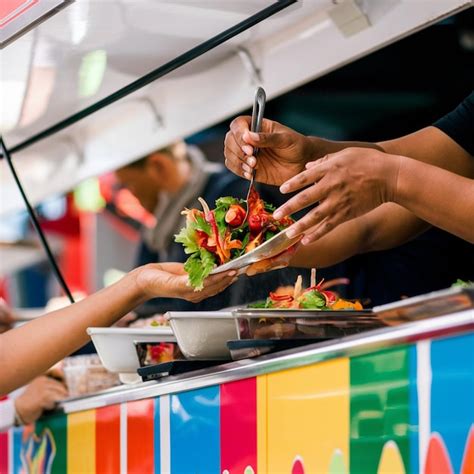 Food truck vendor with food prep station | Premium AI-generated image
