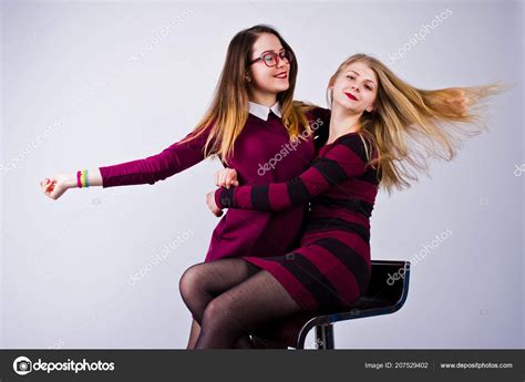 Girls Purple Dresses Having Fun Posing Chair Studio — Stock Photo ...