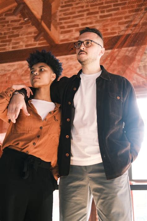 Two People Standing Together 的图像结果