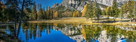 Download wallpaper autumn, trees, mountains, lake, reflection, Italy ...