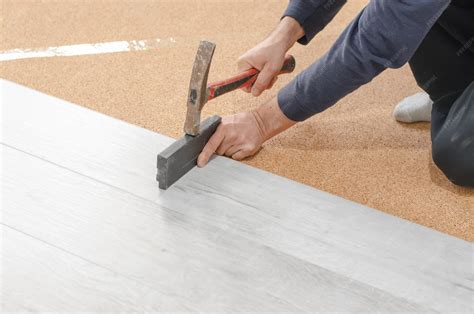 Premium Photo | Professional laying of flooring laminate unrecognizable ...