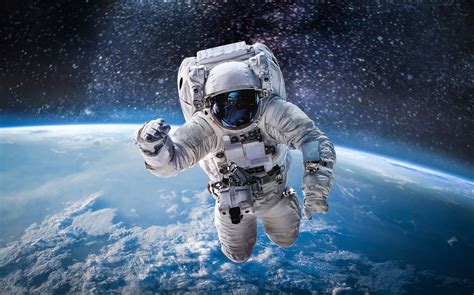 Why do astronauts in space age slower than people on Earth?
