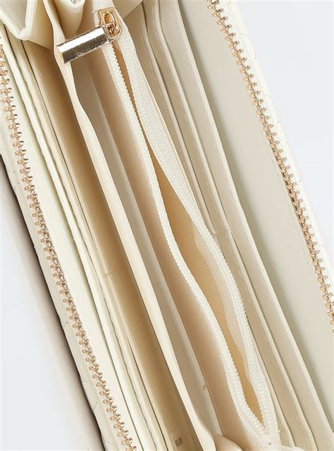 Buy Women Quilted Zip Around Wallet Online at just Rs. 599.0 ...