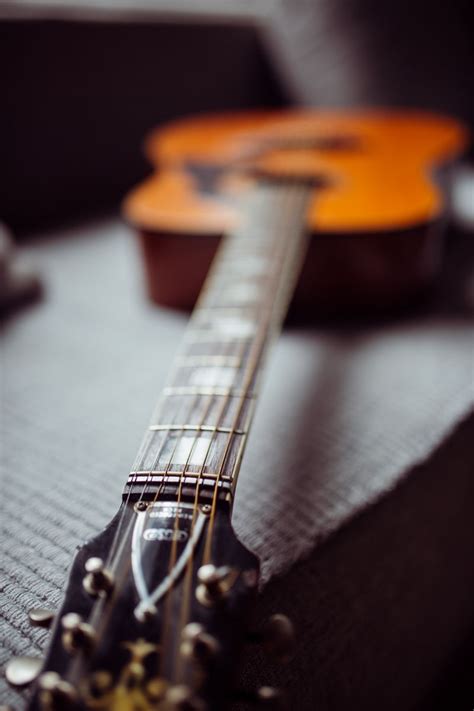 Download wallpaper 800x1200 acoustic guitar, guitar, fretboard, strings ...