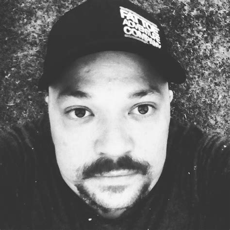 Man Wearing Fat Toe Hat