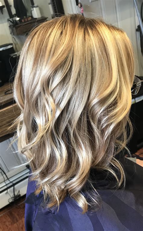 Bright blonde highlights on dark blonde hair color | Hair color blonde ...