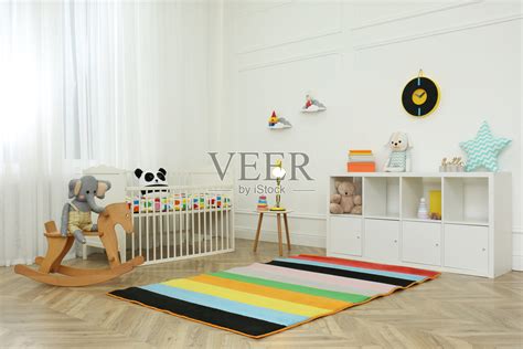可爱的婴儿房内饰有时尚的家具和玩具照片摄影图片_ID:396861846-Veer图库