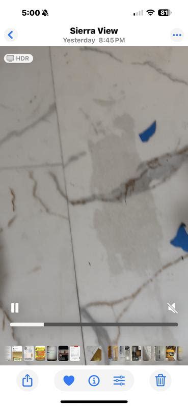 Pergo Marbella Limestone Gray Stone Look 22-mil x 12-in W x 24-in L ...