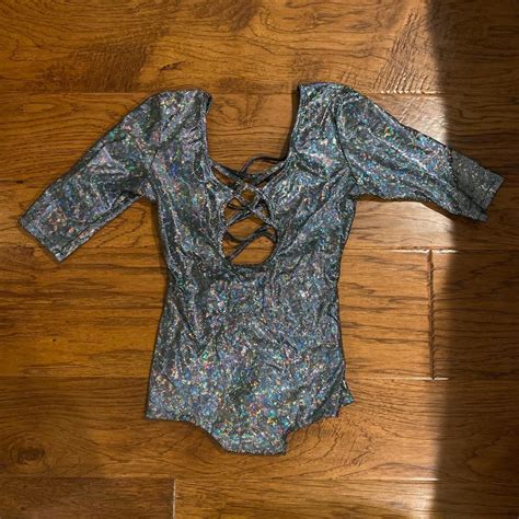 Iheartraves silver holographic bodysuit with low... - Depop