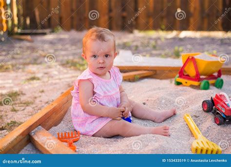 Adorable Baby Play with Sand in Sandbox on Playground, Summer Childhood ...