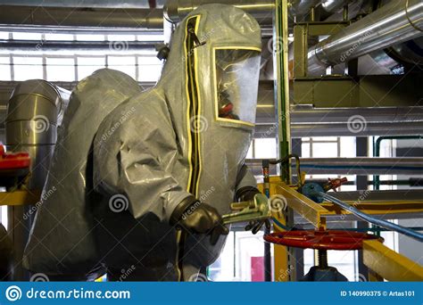 Rescuers In A Radiation Protection Suit Stock Image - Image of person ...