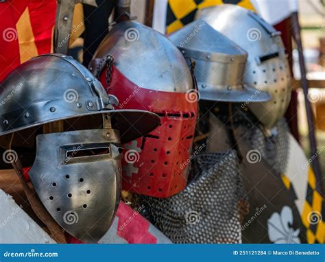 Display of Various Types of Medieval Plate Armor Helmets Editorial ...