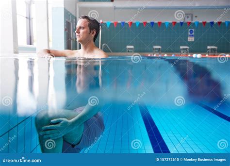 Part Underwater View of Male Swimmer Warming Up in Swimming Pool Stock ...