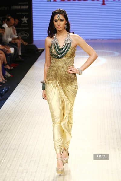Bollywood actress Madhuri Dixit walks the ramp to showcase jewellery ...