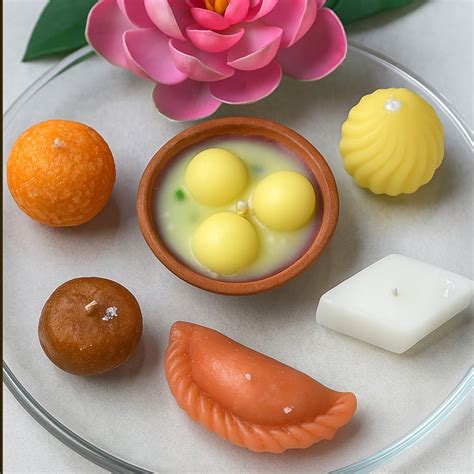 Buy HOMESAKE Set of 12 Scented Indian Sweet Candles from Homesake at ...