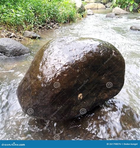 Heavy Boulder Big River Rock Stock Photo - Image of stream, shore ...