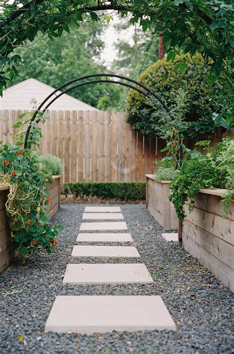 Arch Trellises and Raised Beds in Piney Point Village — Rooted Garden