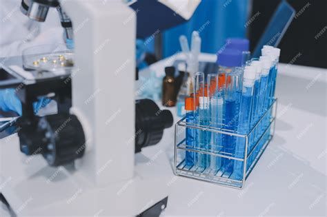 Person Using Microscope 的图像结果