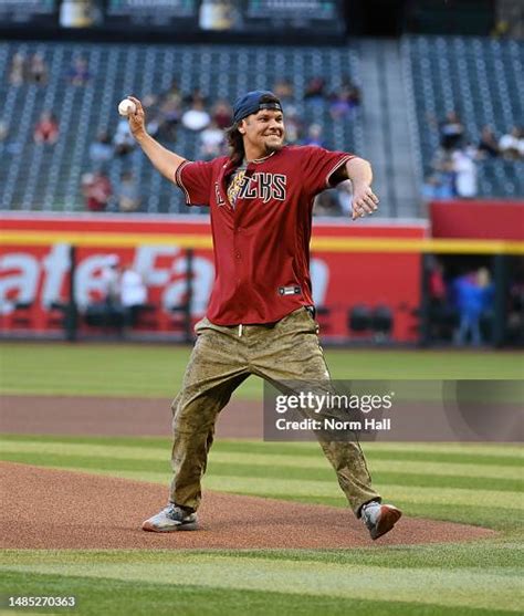 Comedian Theo Von throws out the ceremonial first pitch prior to a ...