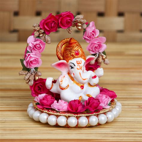 Ganpati With Flowers | Lord Ganesha Idol With Red & Pink Flowers ...