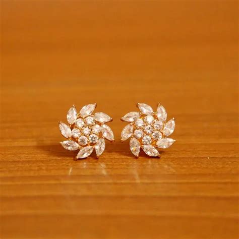 Jewelatoz Diamond Look Flower Shaped Gold Look Studs Price in India ...