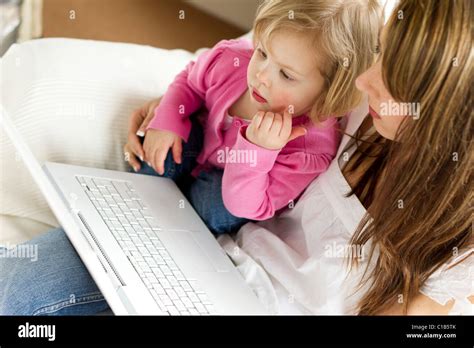 Daughter Using Computer 的图像结果