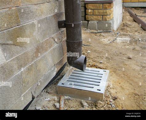 Underground Gutter Drainage System Green Boys LawnCare, Inc.