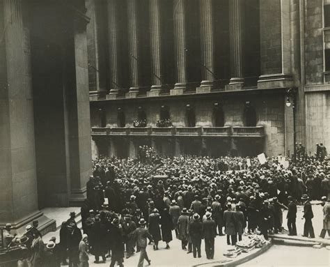 Investors gather at the New York Stock Exchange on Black Tuesday during ...