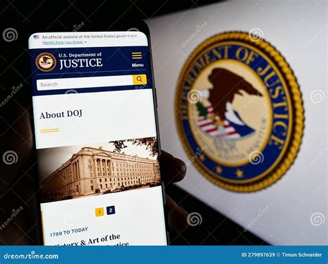 Person Holding Cellphone with Website of United States Department of ...