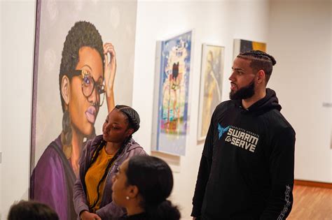 Hornets Players and Walter G. Byers Students visit the Harvey B. Gantt ...