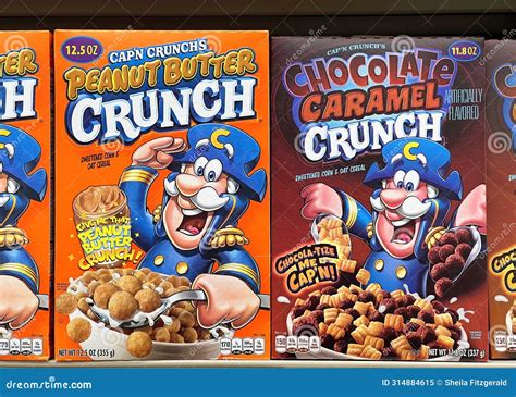 Grocery Store Shelf with Boxes of Cap N Crunch Cereals. Peanut Butter ...