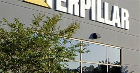 Caterpillar staff numbers fall again despite sales and profits rise ...