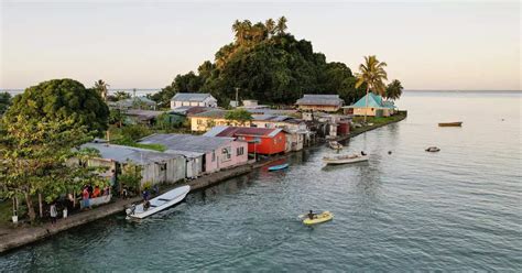 Rising sea levels force Fiji's villagers to relocate; see pics ...