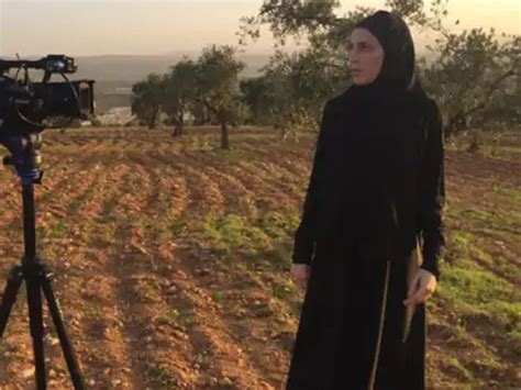 A CNN reporter was seen wearing a veil in Afghanistan, saying the ...