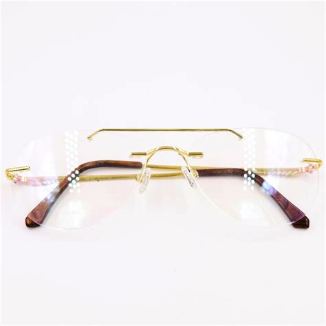 Buy quality Gold 18kt rimless aviator eyeglasses in Surat