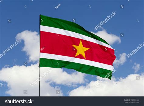 Suriname Flag Isolated On Sky Background Stock Photo 1928341628 ...