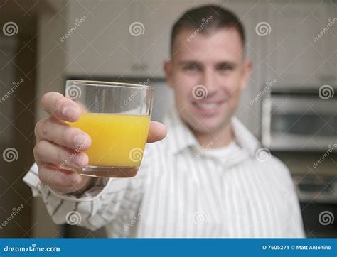 Man and orange juice stock image. Image of holding, drink - 7605271