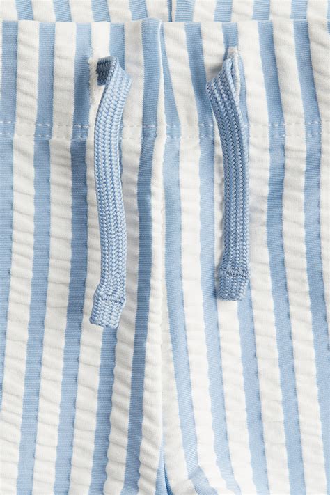 Swimming trunks - Blue/White striped - Kids | H&M IN