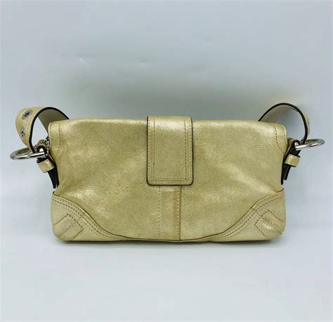 Coach shoulder leather metallic gold handbag# 8321 | Property Room