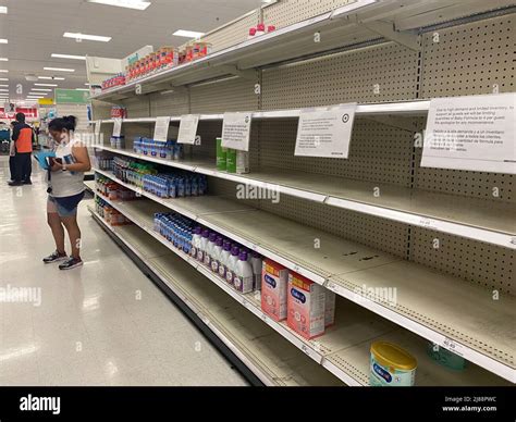 A baby formula display sits nearly empty at a Target store in Orlando.