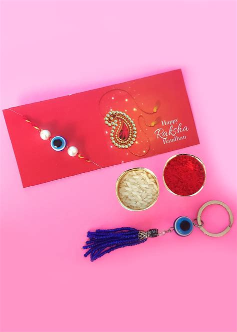 Get Evil eye Gemstone Rakhi with Key chain gift set 1 at ₹ 499 | LBB Shop