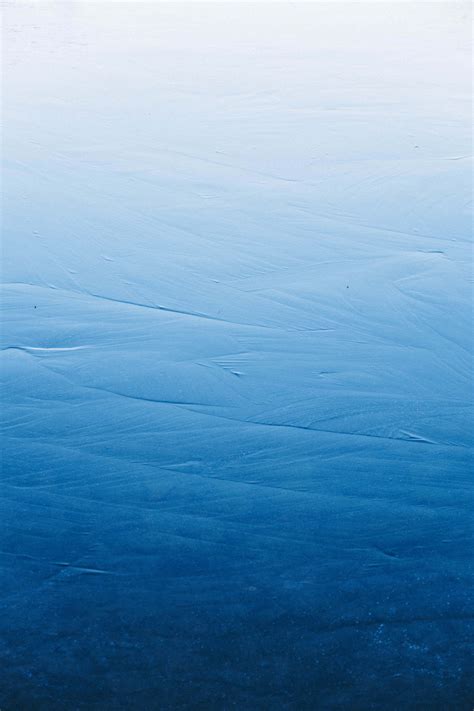 Download Blue Ocean Water Surface Color Background | Wallpapers.com
